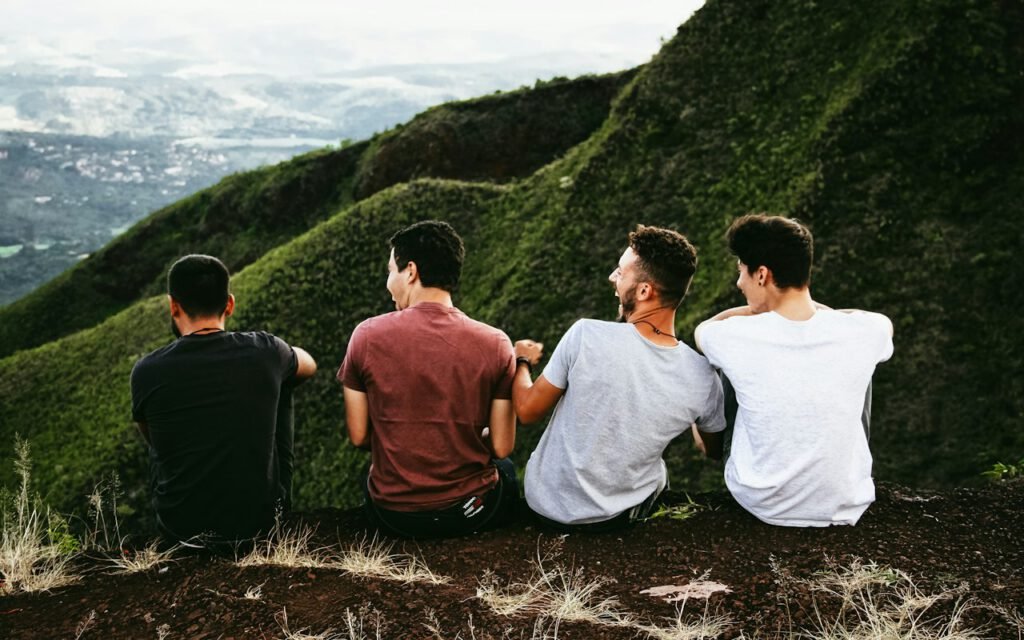 Group of friends hiking together on a sunny trail