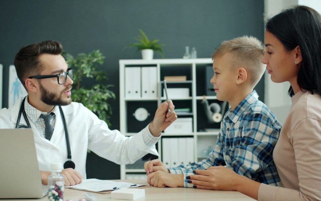 A child at a health visit with a caregiver