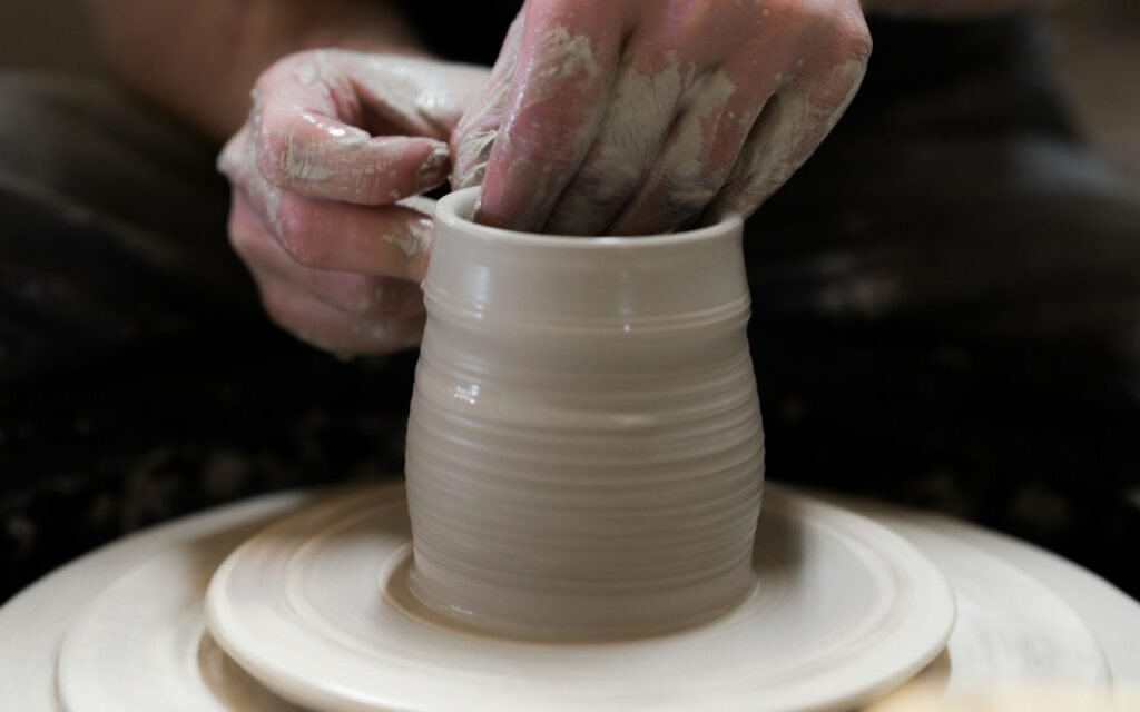 A handmade ceramic bowl on a wooden surface