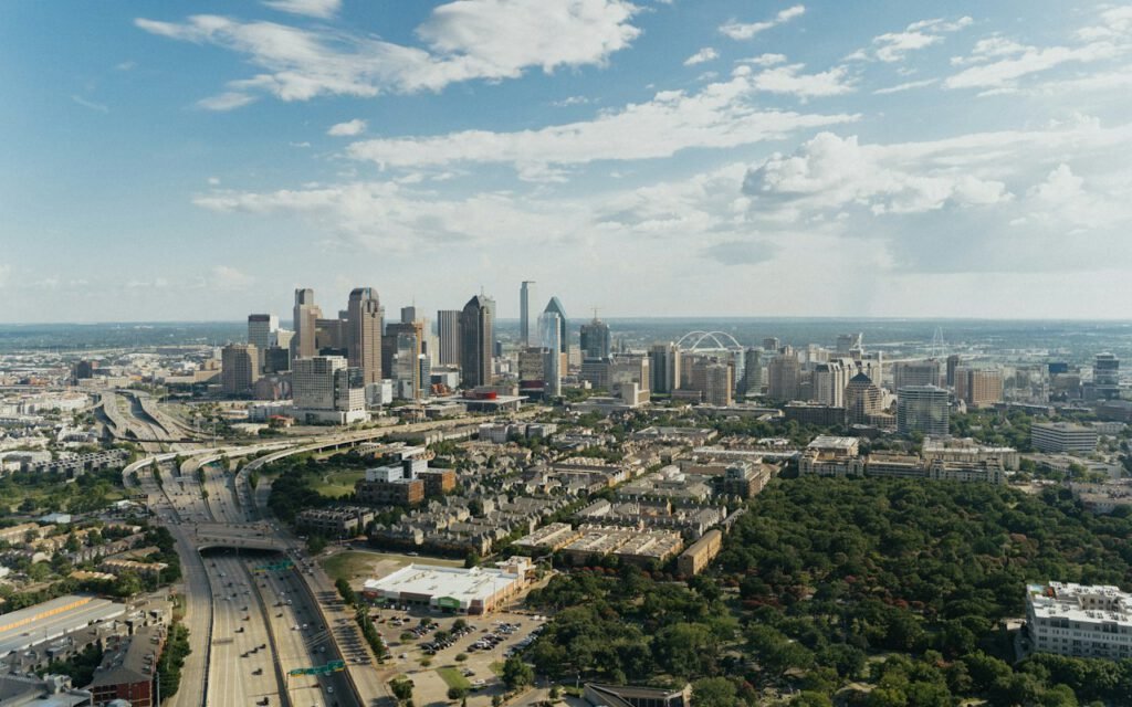 An aerial view of a city with streets and buildings