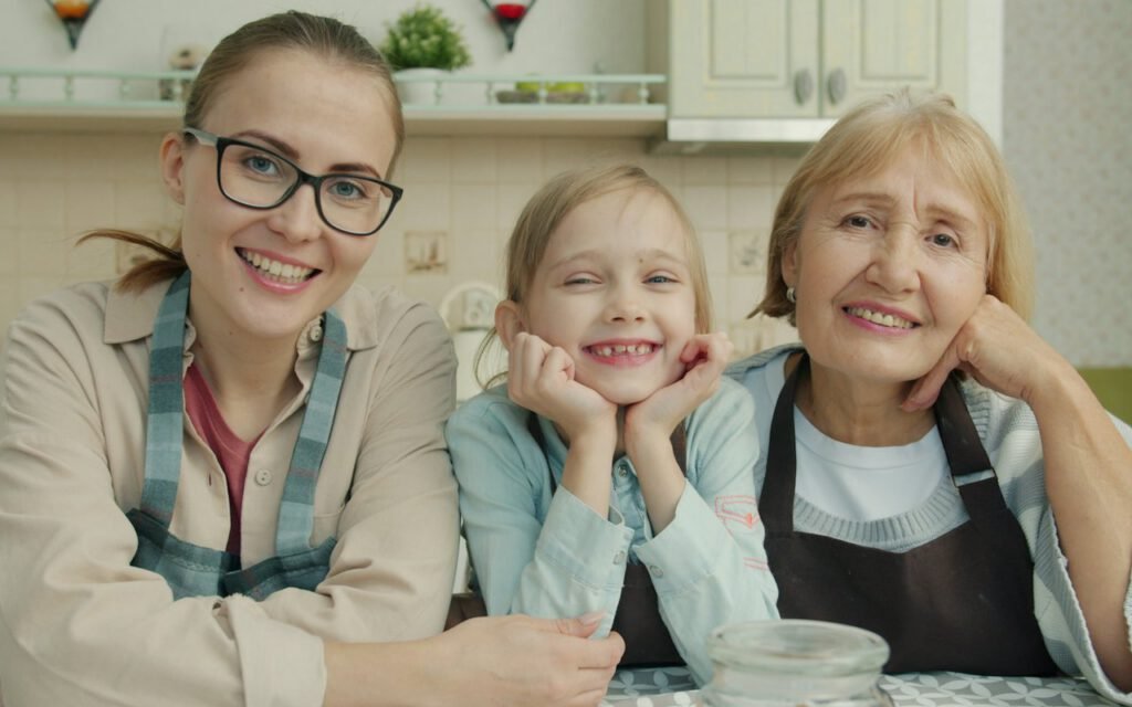 A family cooking a meal together in a home kitchen