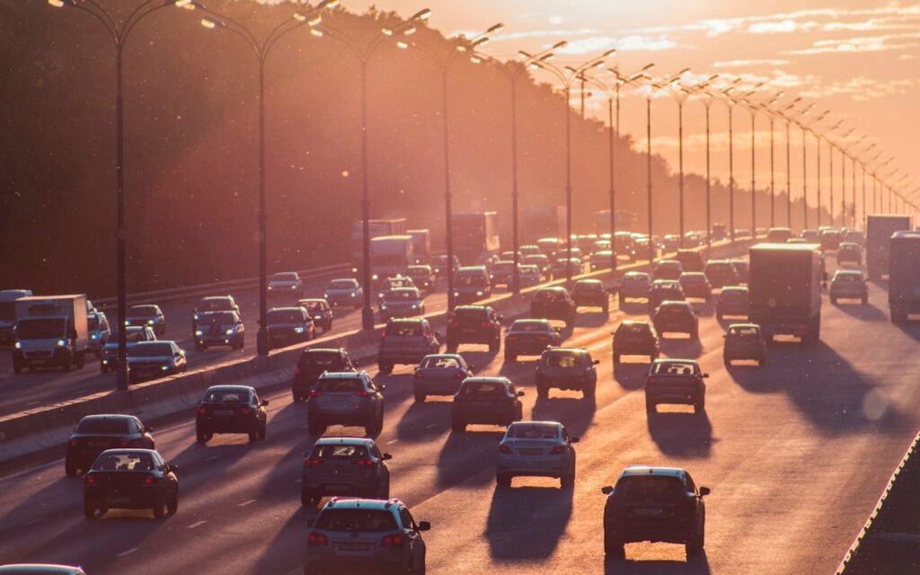 Cars moving slowly in heavy freeway traffic