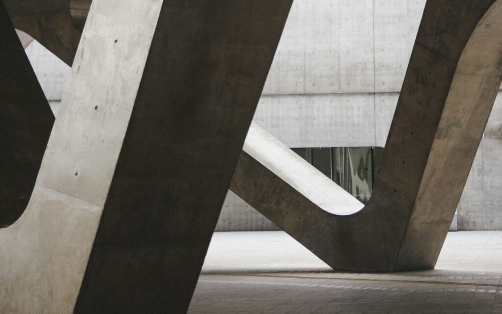 A tall concrete structure with visible formwork lines