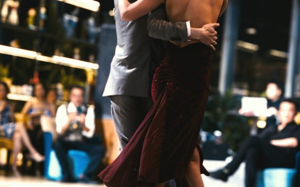 A couple sharing their first dance at a wedding reception