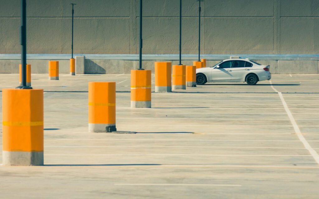 An open parking lot with marked spaces