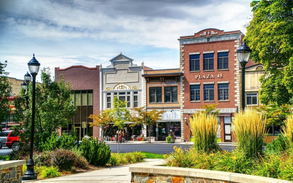 A historic clock tower building in a city downtown
