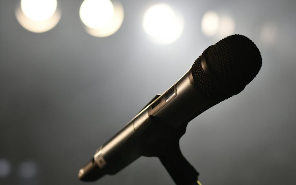 A row of press microphones set up for an interview