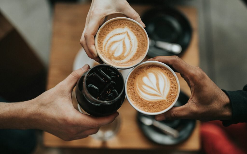 Several cups of coffee on a café table