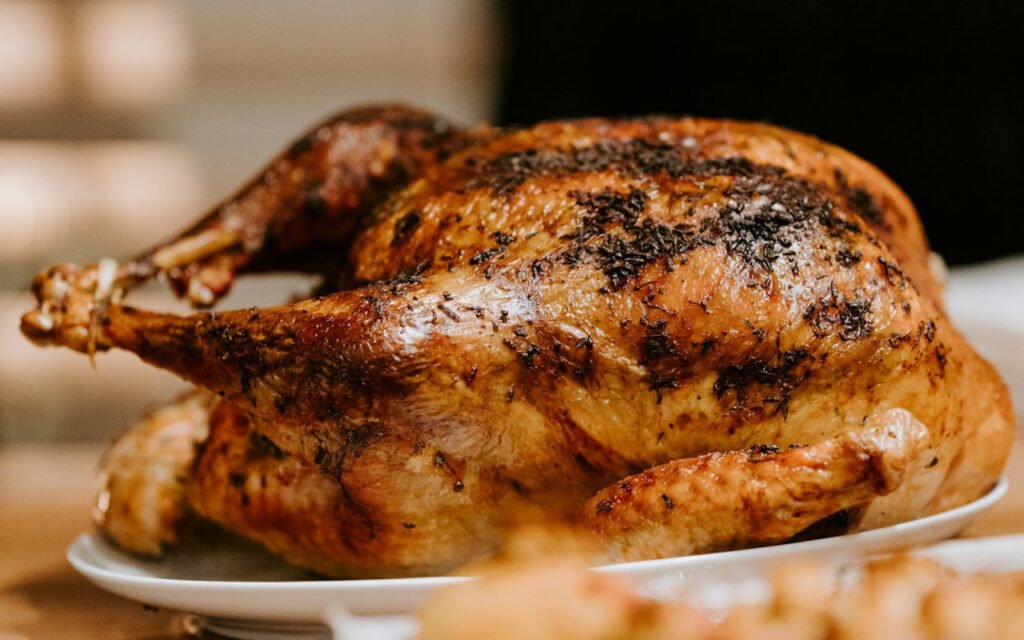 Roasted chicken with golden skin and vegetables