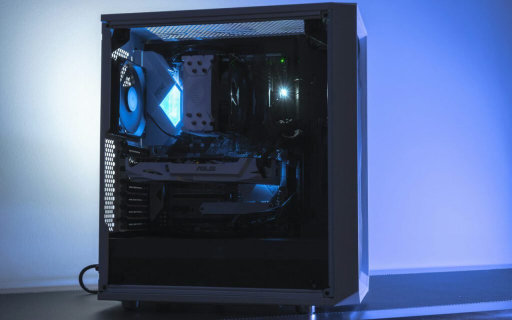 The inside of an electronics case lit with blue light