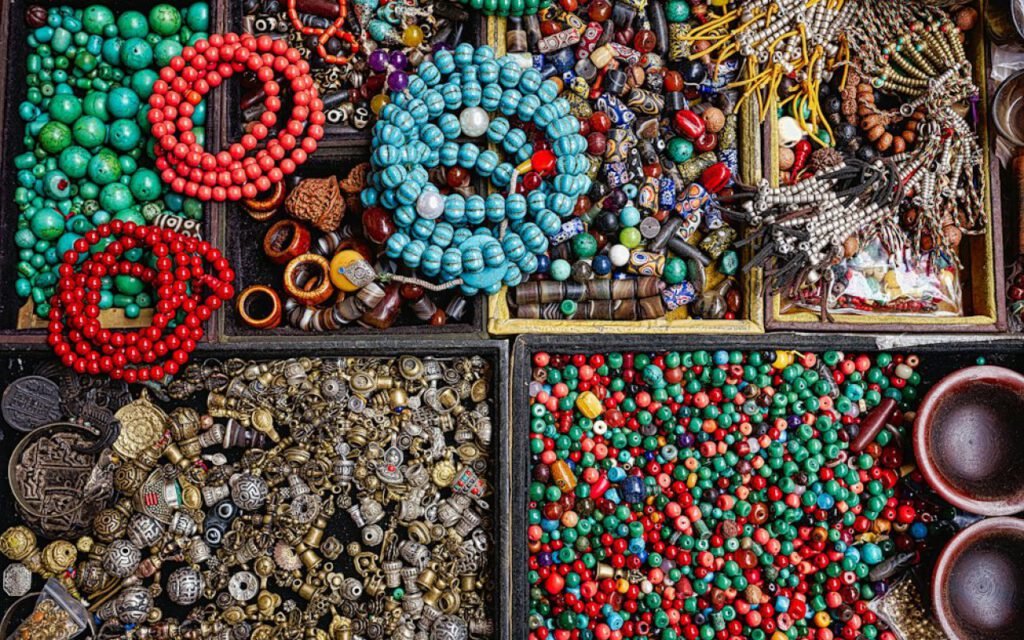 Colorful beads sorted into small containers