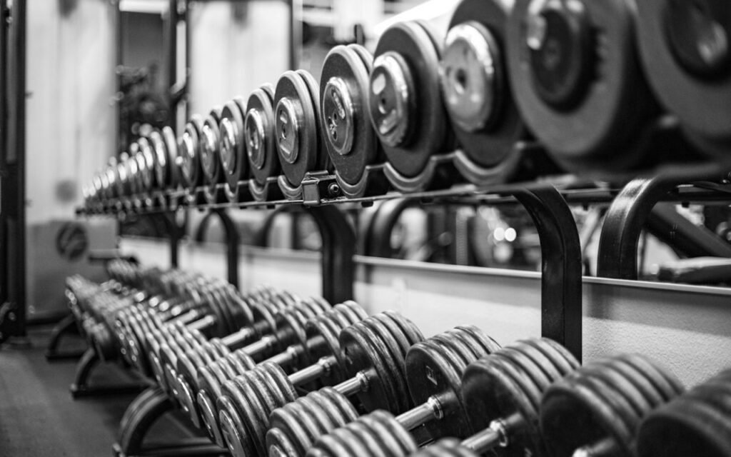 A rack of dumbbells in a range of weights