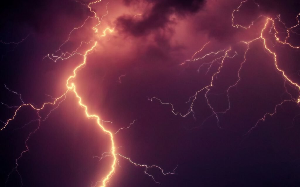 Lightning over a dark sky at night