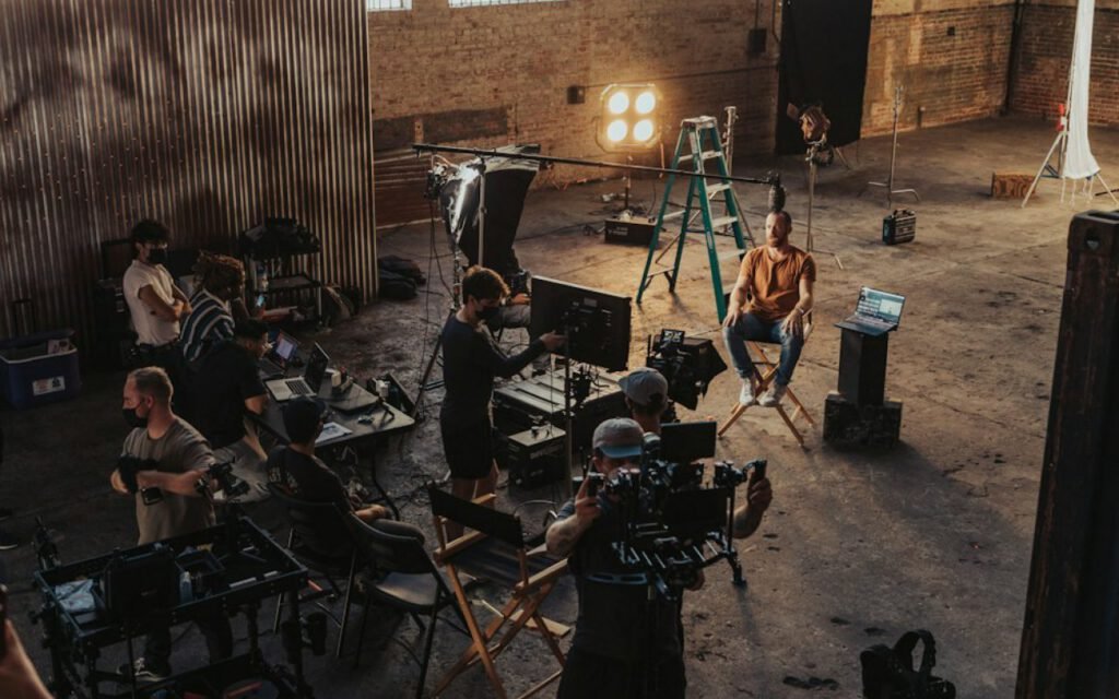 A pair of film lights rigged on stands