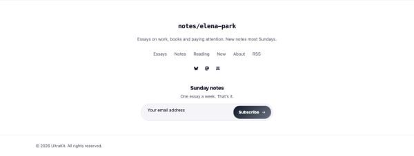 Footer 26 section — Writer’s blog · quiet monospace, centered